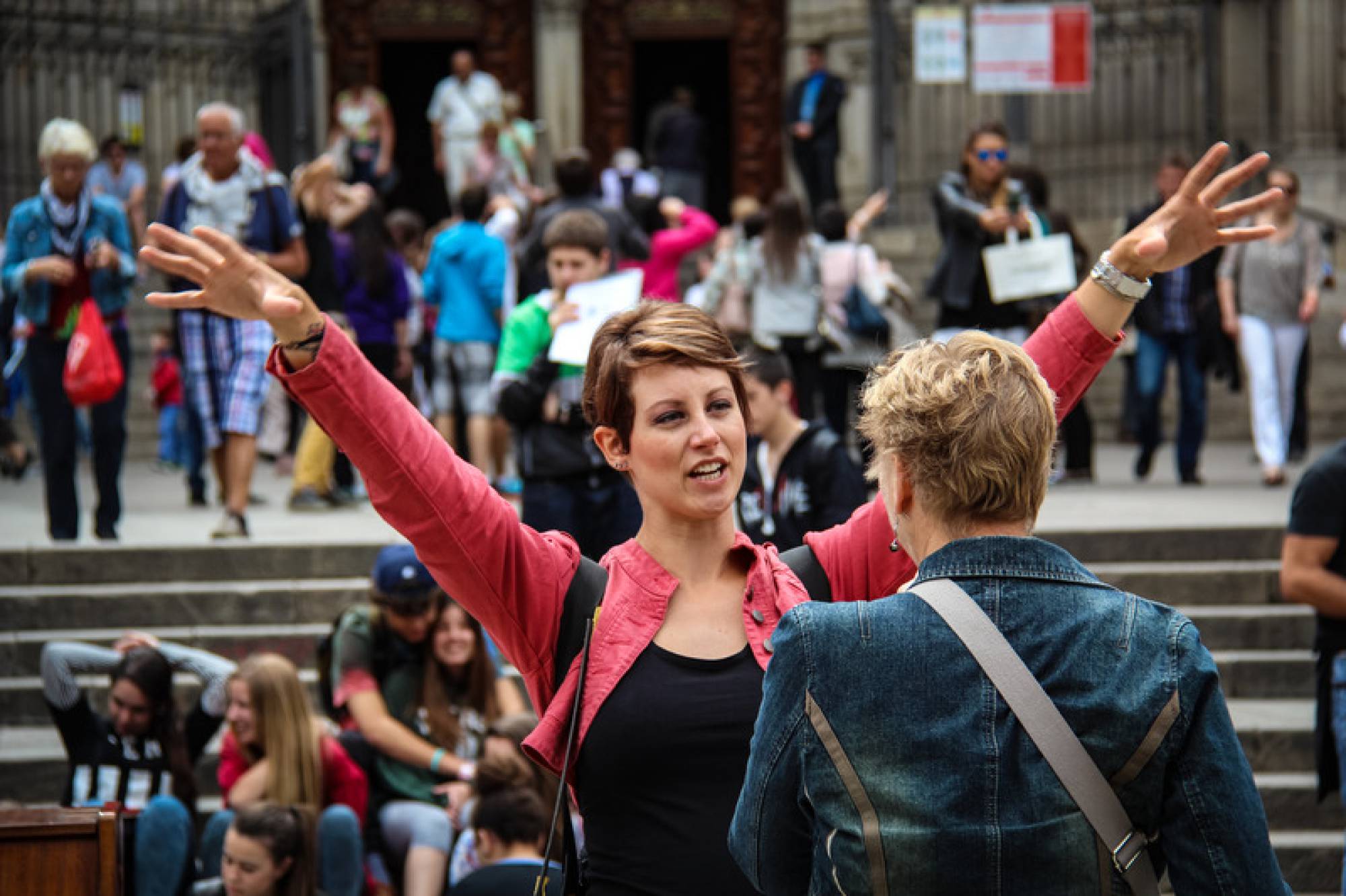 Canva - Woman Racing Hands Front of another woman