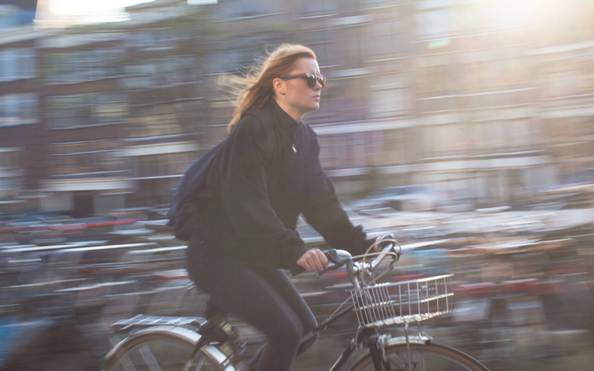 Canva - Woman Riding Bicycle